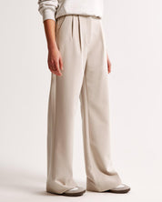 Hoge taille pantalon dames – geplooide pantalon met elegante tapered fit