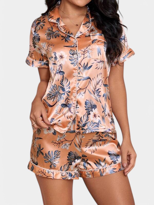 Gleame satijnen pyjamaset dames – luxe tropische print met bies