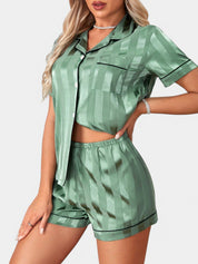 Gleame satijnen pyjamaset dames – luxe tropische print met bies