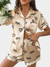 Gleame satijnen pyjamaset dames – luxe tropische print met bies