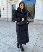 Lange gewatteerde dames winterjas – stijlvolle puffer coat met taille-riem