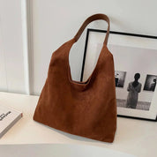 Elisa schoudertas dames – elegante suède tas in roestbruin