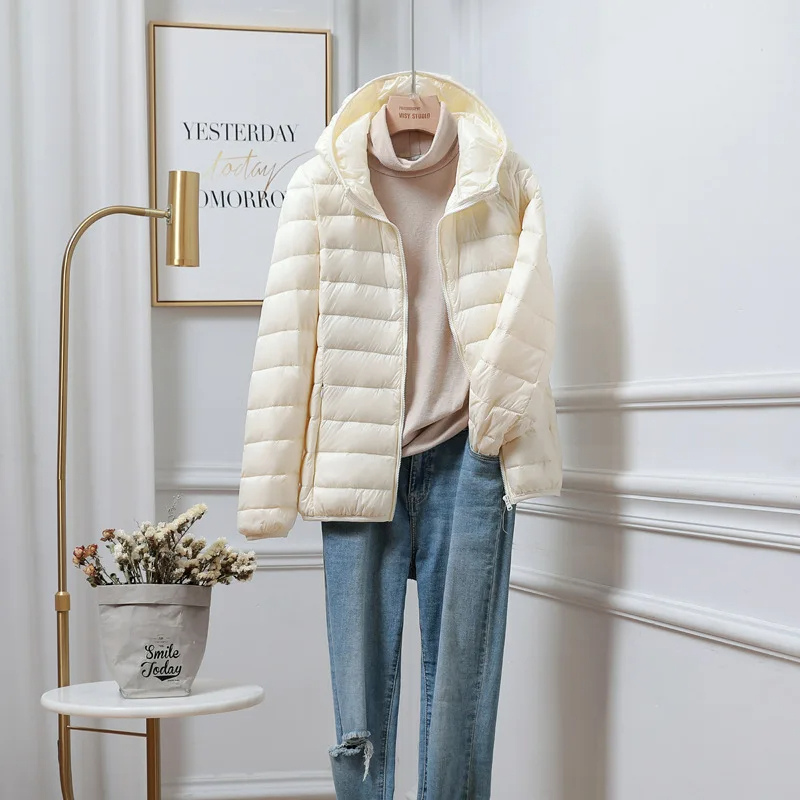 Lichte dames puffer jas met capuchon – warme gewatteerde jas voor de winter