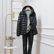 Lichte dames puffer jas met capuchon – warme gewatteerde jas voor de winter