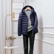 Lichte dames puffer jas met capuchon – warme gewatteerde jas voor de winter