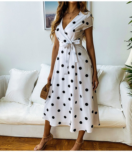 Juna Jurk met Stippen – Vrolijke en Elegante Damesjurk met V-Hals en Strikdetail