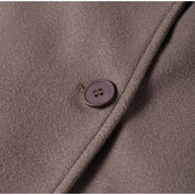 Oversized damesjas met reverskraag – lange winterjas met dubbele knopen