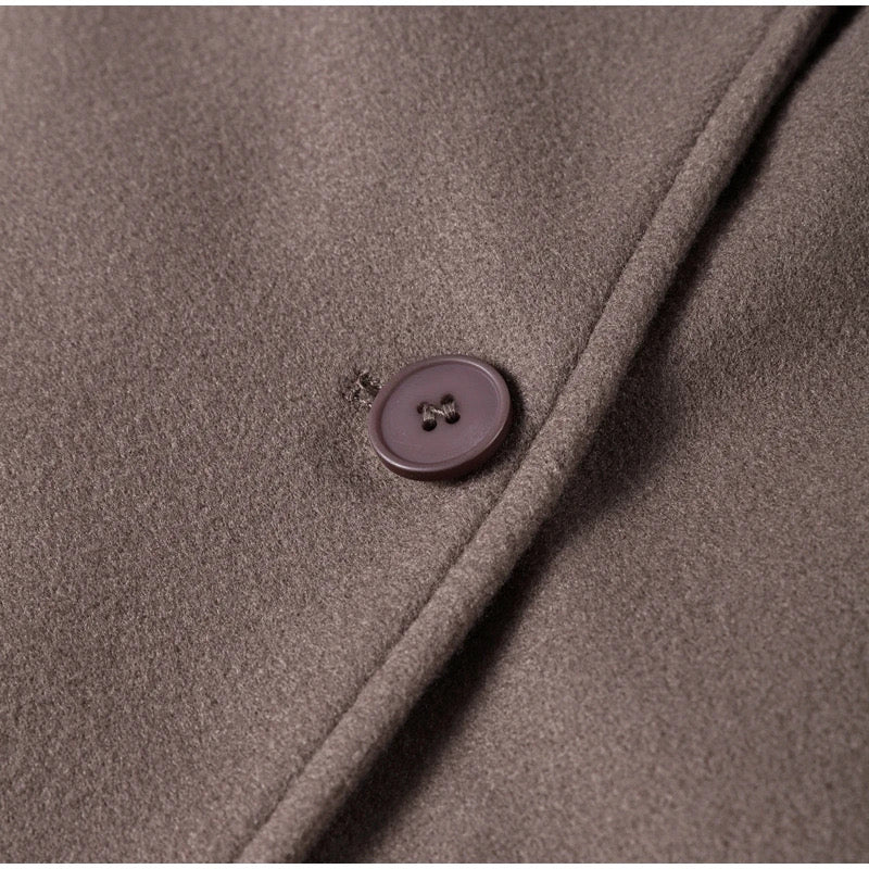 Oversized damesjas met reverskraag – lange winterjas met dubbele knopen