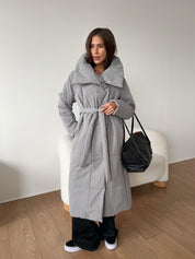 Lange gewatteerde dames winterjas – stijlvolle puffer coat met taille-riem