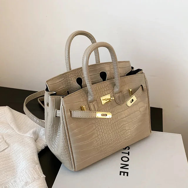 Chic dames handtas – gestructureerde krokoprint tas met goudkleurige details