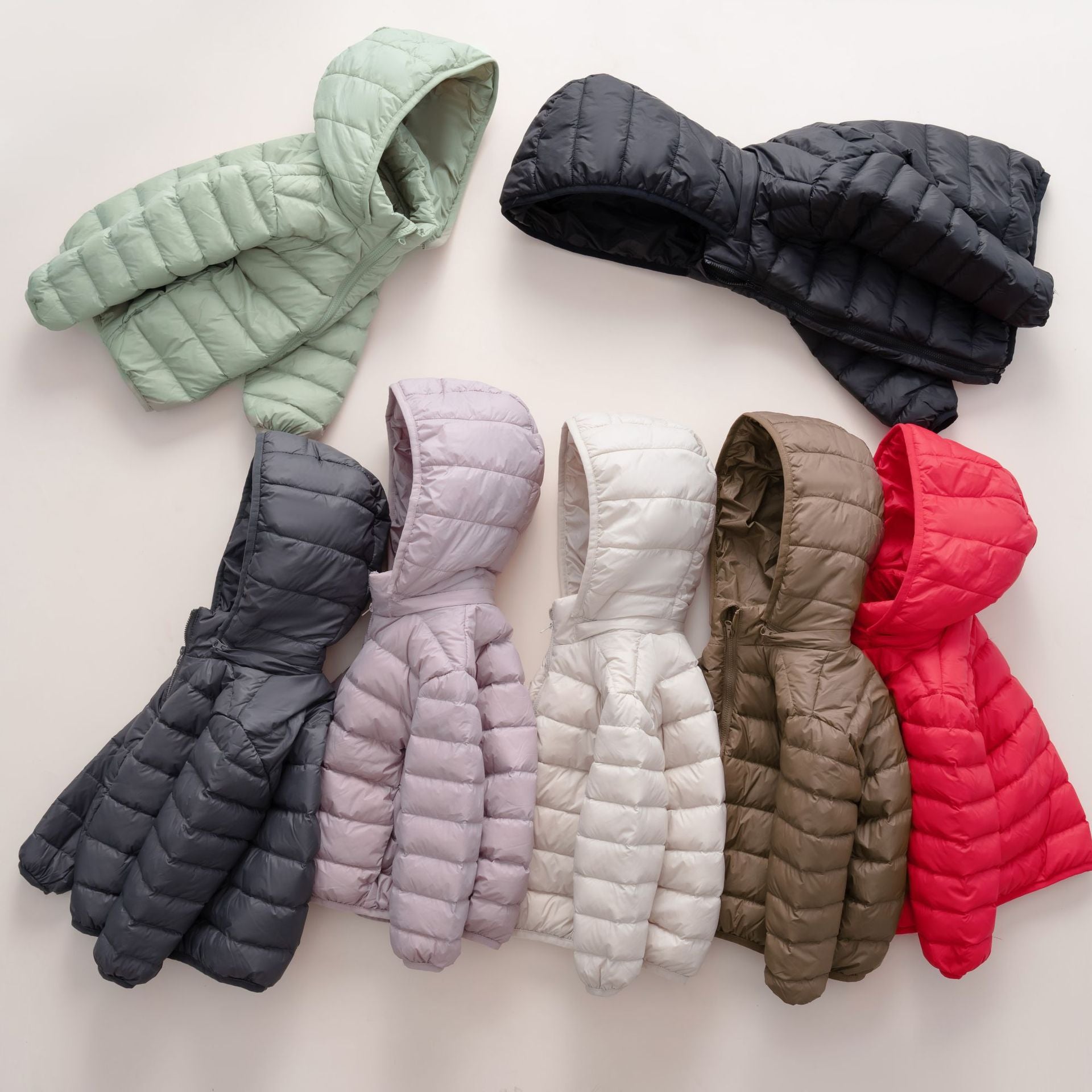 Dames gewatteerde winterjas met capuchon – warme lichtgewicht jas voor koude dagen