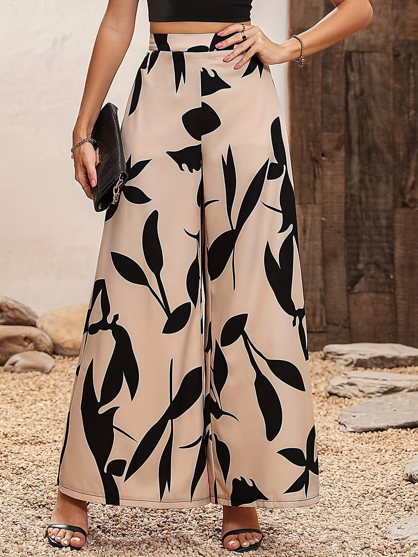 Heidi dames broek – luchtige bloemenbroek met wijde pijpen en elastische taille