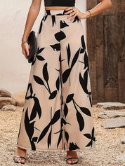 Heidi dames broek – luchtige bloemenbroek met wijde pijpen en elastische taille