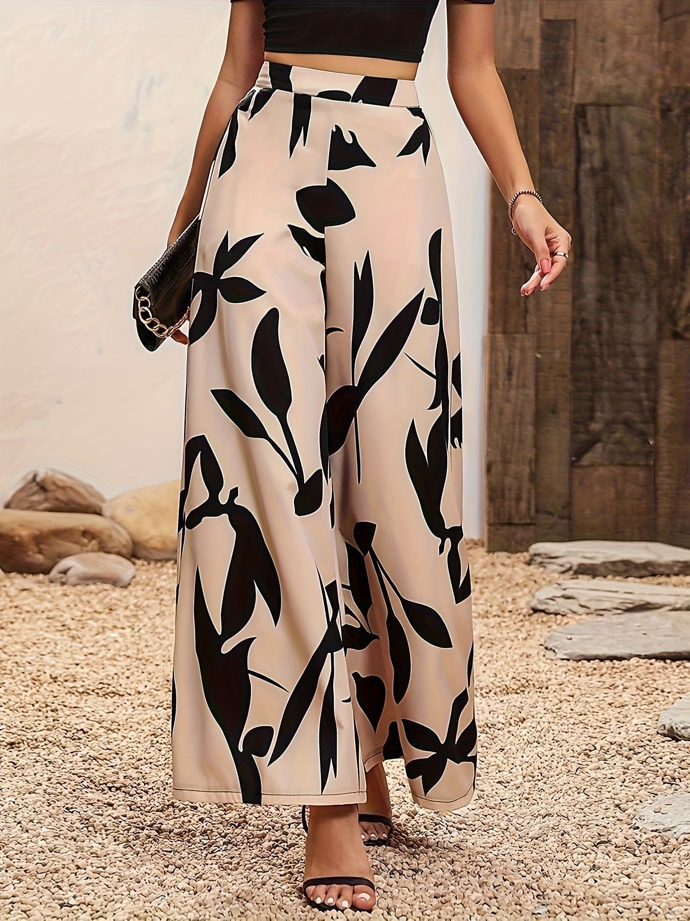 Heidi dames broek – luchtige bloemenbroek met wijde pijpen en elastische taille