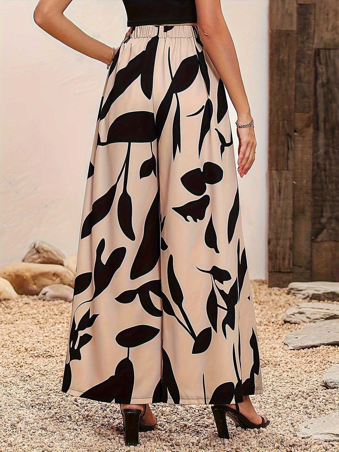 Heidi dames broek – luchtige bloemenbroek met wijde pijpen en elastische taille