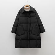 Dames gewatteerde winterjas – lange pufferjas met ruime pasvorm en praktische zakken