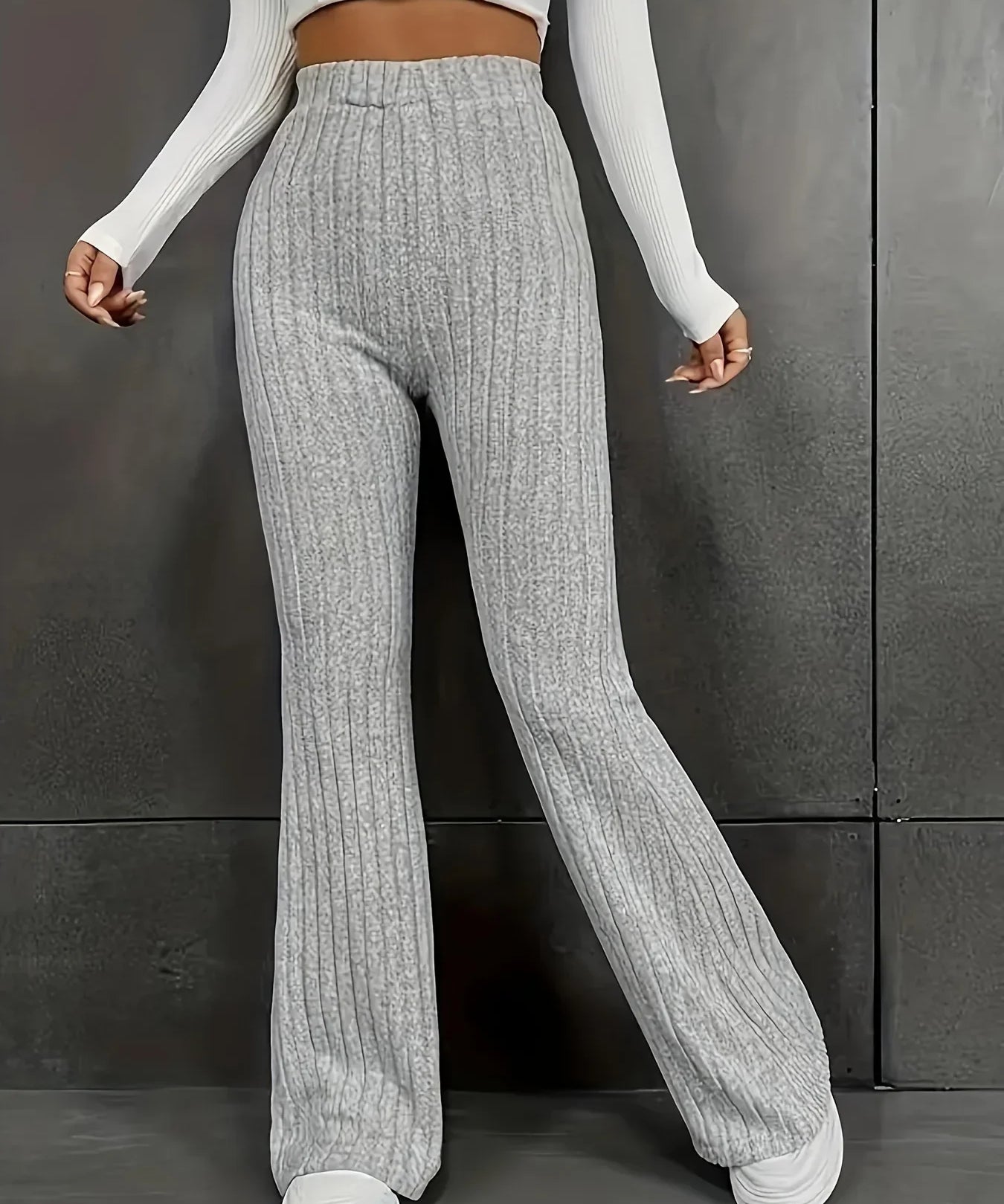 Dames broek – hoge taille slim fit met flared pijp & geribbelde stretchstof