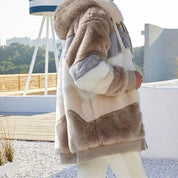 Fibi Pluche Vest met Capuchon – Oversized Fluffy Damesvest voor Warmte & Comfort