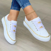 Stijlvolle dames sneakers met gouden detail – comfortabele en chique schoenen