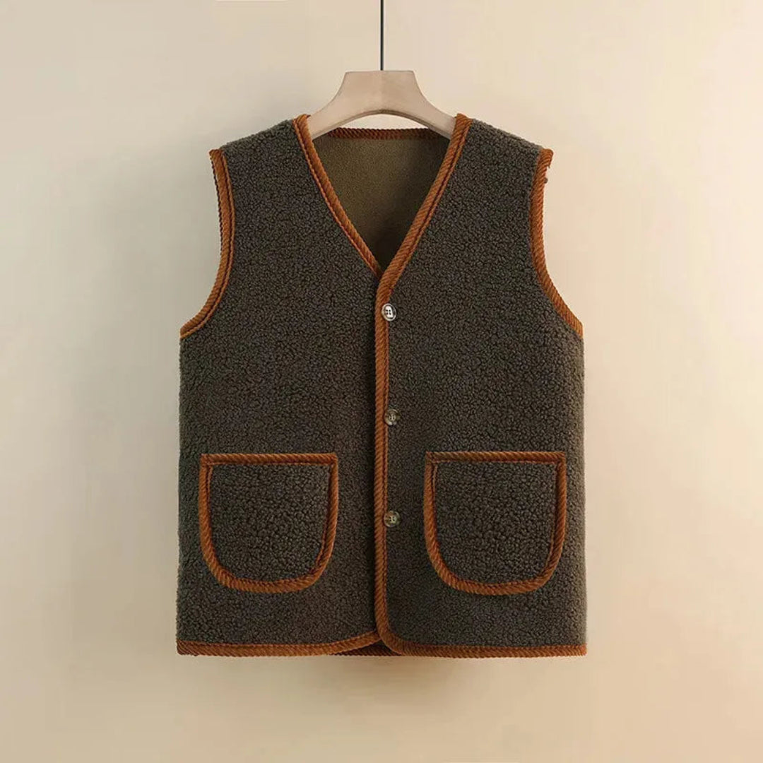Wollblende_Sherpa-Weste_Damen_mit_V-Ausschnitt_und_Patch-Taschen__Bequem_und_Stilvoll__Armellos__Verschiedene_Farben_und_Grossen_0.jpg