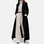 Dames lange zwarte mantel – elegante maxi coat met kraag en knoopsluiting