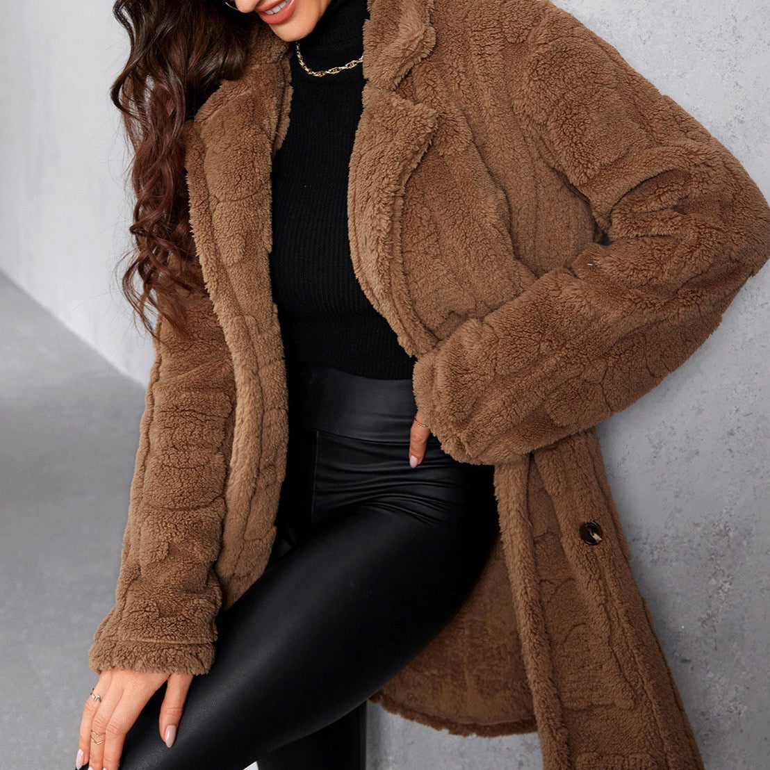 Oversized dames winterjas – zwarte fleecejas met brede revers en warme fit