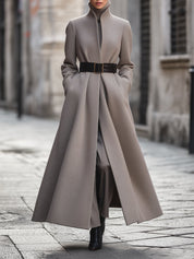 Lange dames winterjas – elegante A-lijn mantel met ceintuur en funnel nec