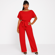 Elva jumpsuit met strikceintuur – elegante dames overall voor dag en avond