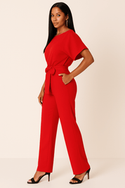 Elva jumpsuit met strikceintuur – elegante dames overall voor dag en avond